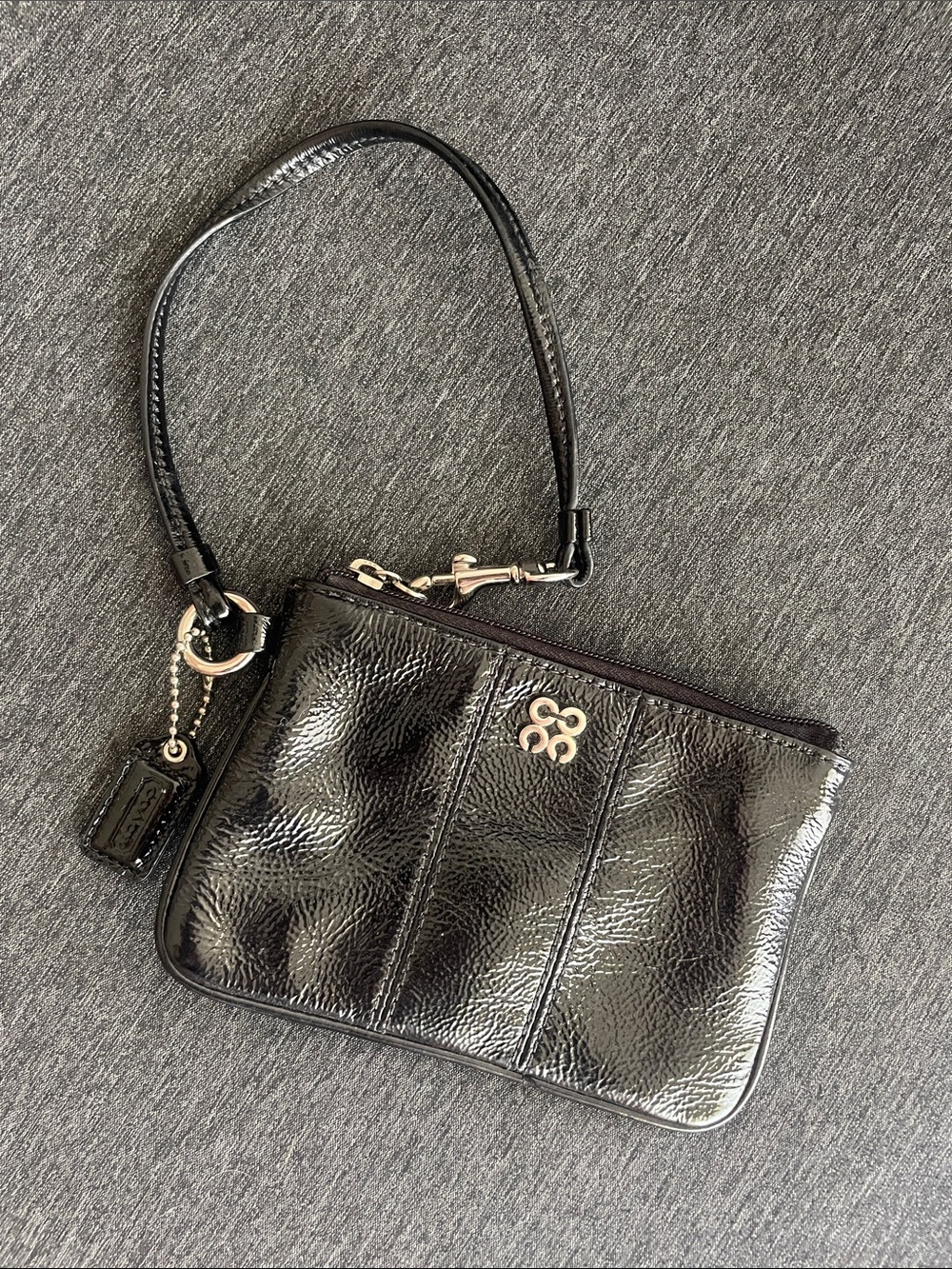 COACH wristlet patent leather black